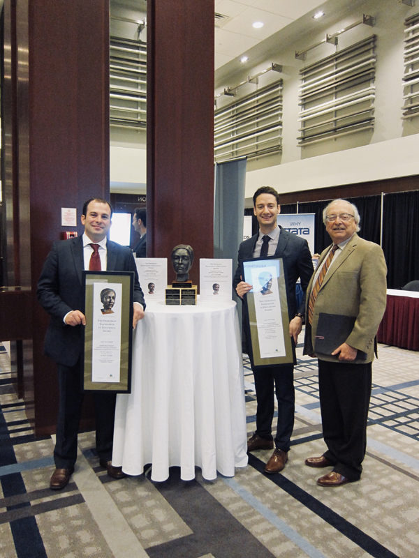 Photo: Luke Devine and Eric Kaplovitch with Ted Freedman.
